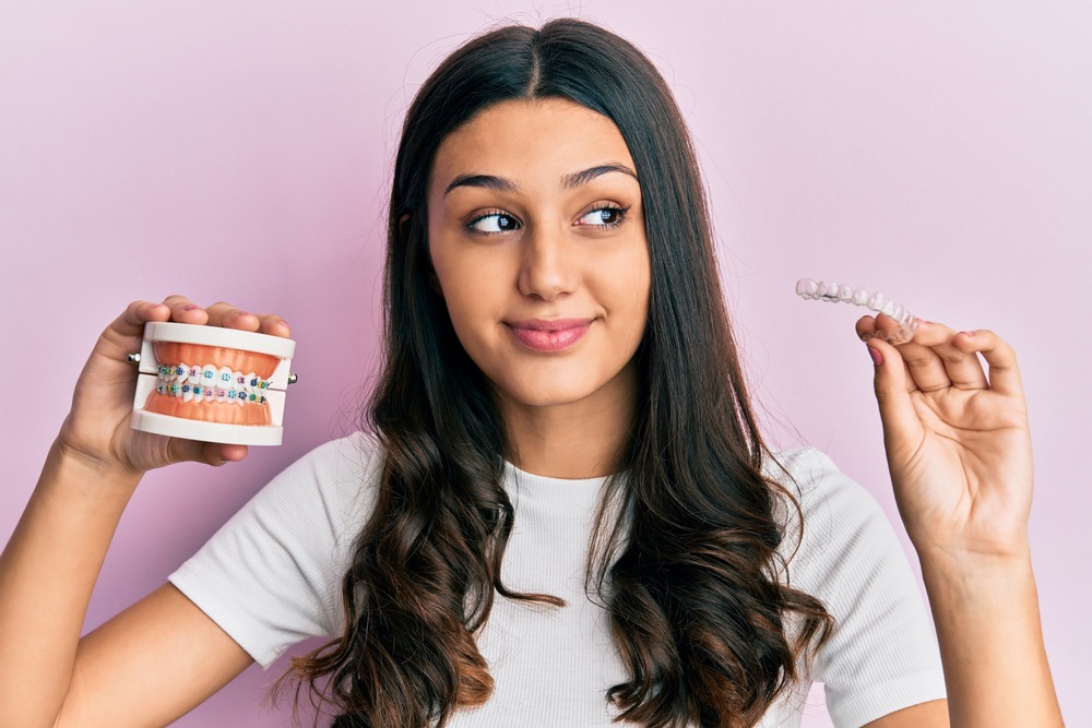 invisalign vs braces in calgary which is better for adults