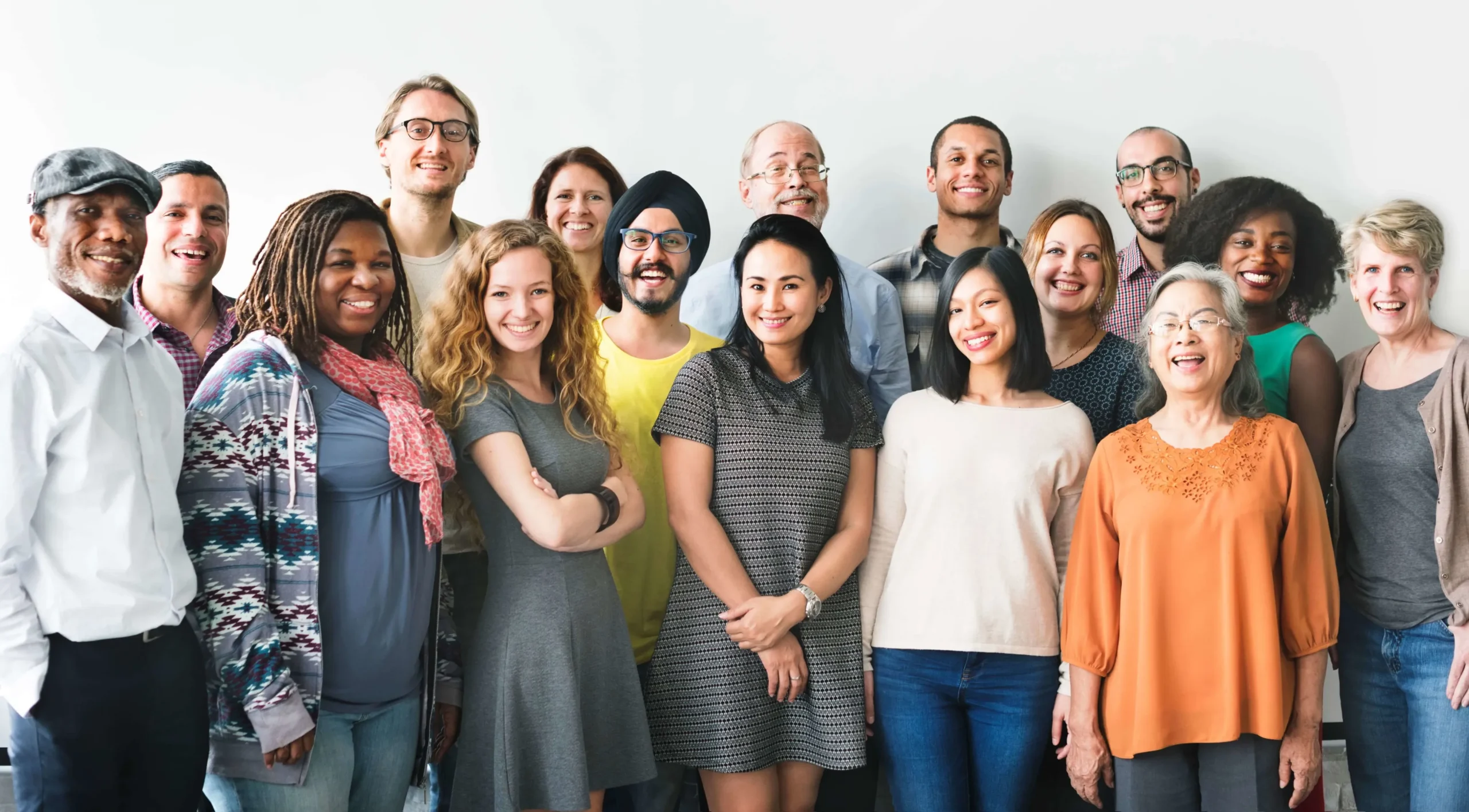 Diverse patients smiling at a trusted dentist in NE Calgary dental clinic